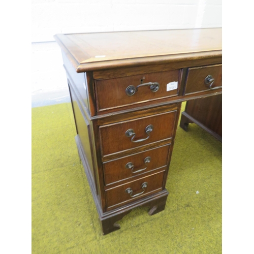 1116 - Leather topped Kneehole pedestal desk in good order. H:30 x W:48 x D:24 inches. See photos.