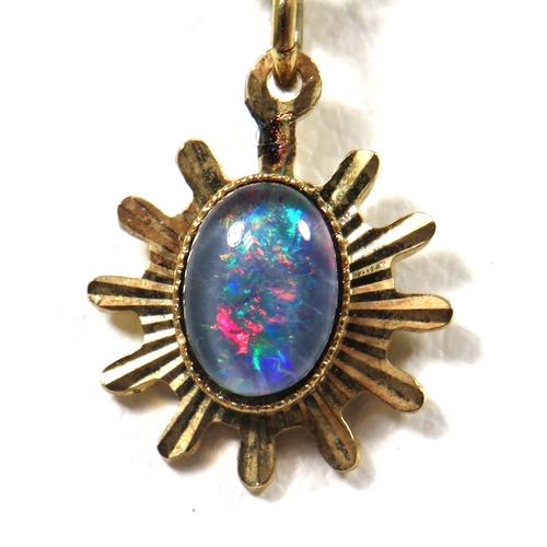 517 - Australian Opal set pendant with Yellow metal mount and 16 inch Yellow Metal Chain with Captian Cook... 