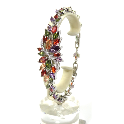 520 - 925 Silver Bracelet set with Multi Coloured Gemstones.  8 inches with two adjusters fitted.  See pho... 