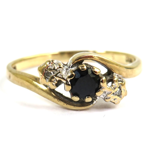 540 - 9ct Yellow Gold Ring set with a central Sapphire with two melee Diamonds to sides. Finger size 'N-5'... 