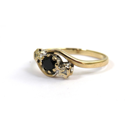 540 - 9ct Yellow Gold Ring set with a central Sapphire with two melee Diamonds to sides. Finger size 'N-5'... 