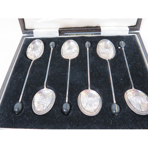 546 - Cased Hallmarked Silver Coffee Bean Spoons.  Total weight 25.1g