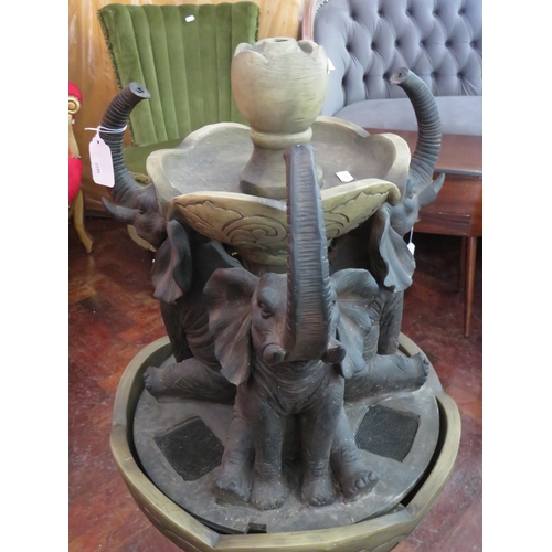 558 - Carved Resin wood effect indoor water feature.  34 inches tall. Comes with electrical pump and compo... 