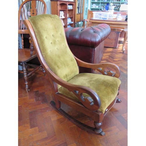 562 - Late 19th/Early 20th Century Upholstered Rocking chair with Mahogany Frame in good order. See photos... 