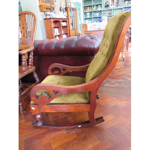 562 - Late 19th/Early 20th Century Upholstered Rocking chair with Mahogany Frame in good order. See photos... 