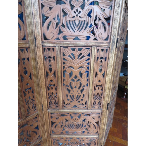 564 - Oak Four panel screen with pierced fretwork decoration. Each panel measures approx 72 x 20 inches. I... 