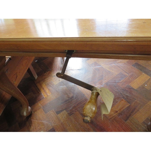 567 - Late 19th/Early 20th Century wind out Dining Table with single extension leaf. Raised on legs with o... 