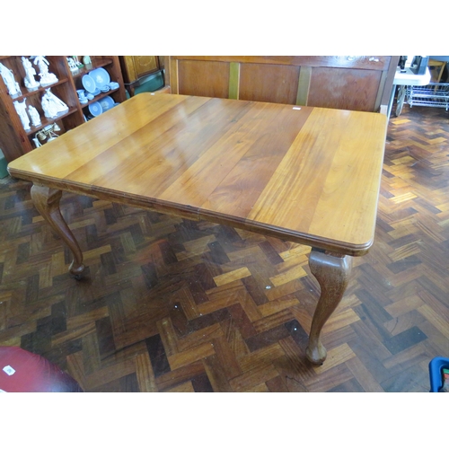 567 - Late 19th/Early 20th Century wind out Dining Table with single extension leaf. Raised on legs with o... 