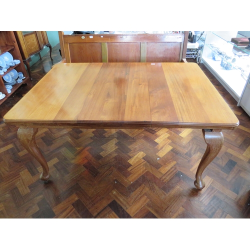 567 - Late 19th/Early 20th Century wind out Dining Table with single extension leaf. Raised on legs with o... 