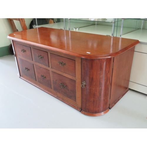 568 - Mahogany low six drawer unit with curved cupboard doors to side.  H:19 x W:48 x D:21 inches. See pho... 