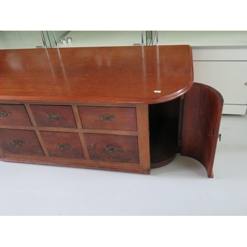 568 - Mahogany low six drawer unit with curved cupboard doors to side.  H:19 x W:48 x D:21 inches. See pho... 