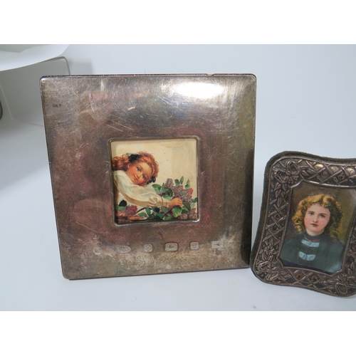 573 - Four Vintage Hallmarked Silver Photo Frames. The largest being  5 x 4.5 inches. See photos.