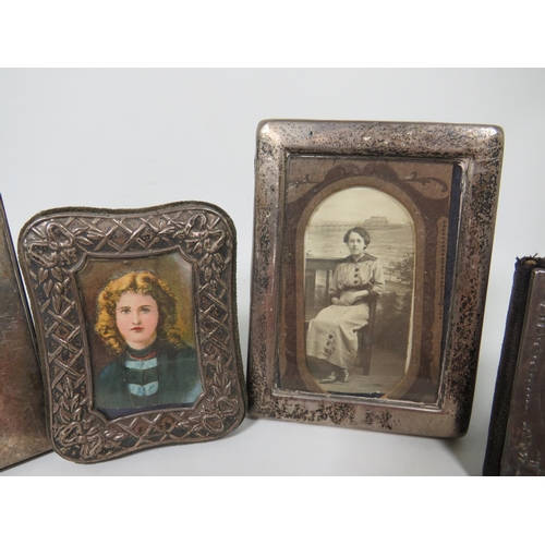 573 - Four Vintage Hallmarked Silver Photo Frames. The largest being  5 x 4.5 inches. See photos.