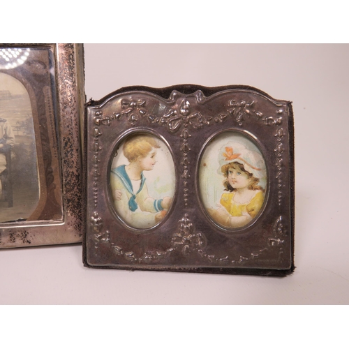 573 - Four Vintage Hallmarked Silver Photo Frames. The largest being  5 x 4.5 inches. See photos.