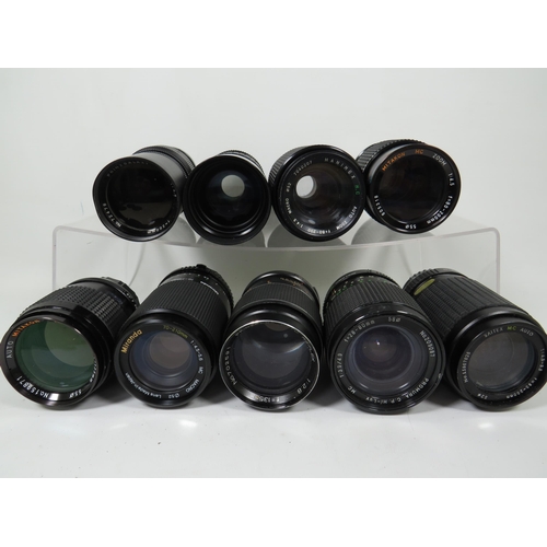 586 - Twelve assorted SLR camera lens by various makers to include Miranda and others.