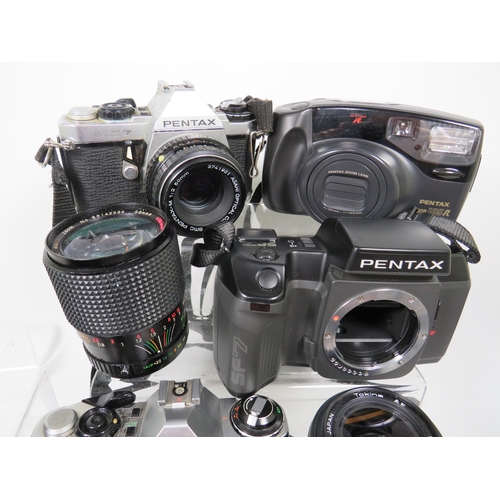 592 - Selection of SLR Camera Bodies by Pentax, Olympus and assorted Lens for SLRs.  See photos.