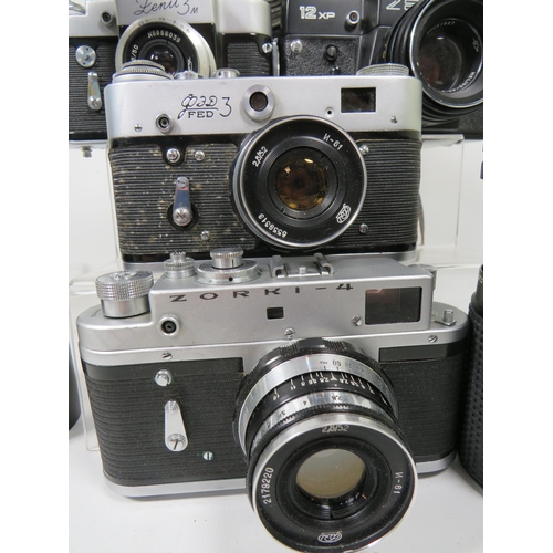 593 - Selection of Vintage SLR Cameras and Lens by various makers to include Zorki and Zenit