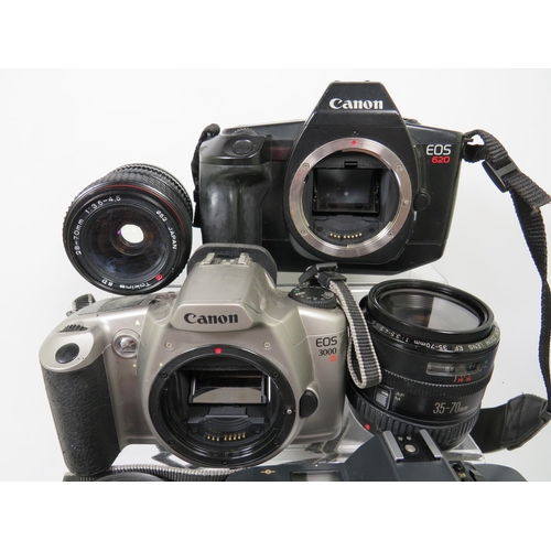 594 - Selection of Canon SLR Cameras and lens to include T70.  see photos