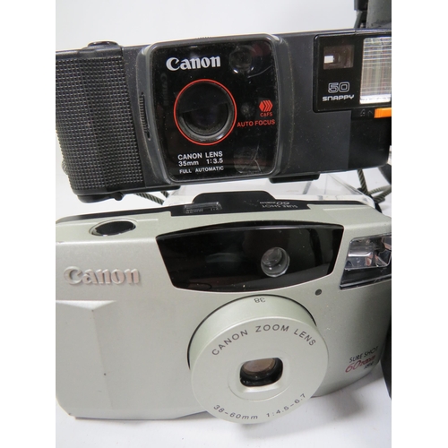 594 - Selection of Canon SLR Cameras and lens to include T70.  see photos