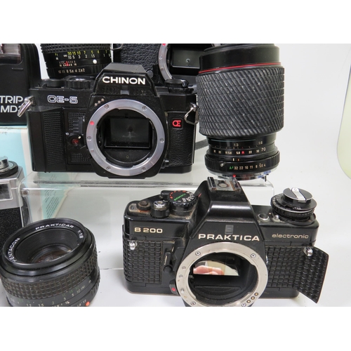 596 - Boxed Sigma Camera outfit to include a 20-80mm lens, instructions etc plus other cameras and lens by... 