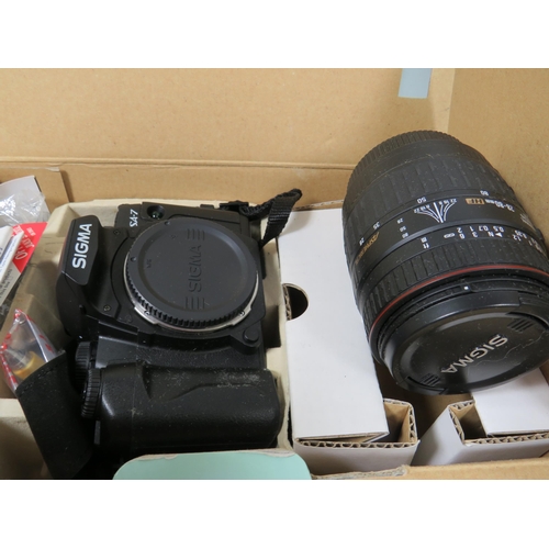 596 - Boxed Sigma Camera outfit to include a 20-80mm lens, instructions etc plus other cameras and lens by... 