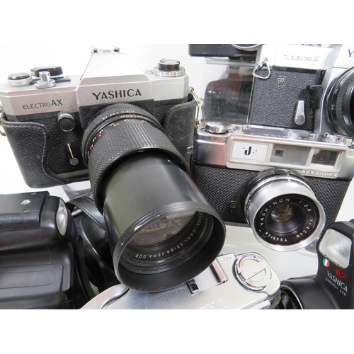 600 - Selection of Yashica Cameras plus Movie Cameras. See photos.