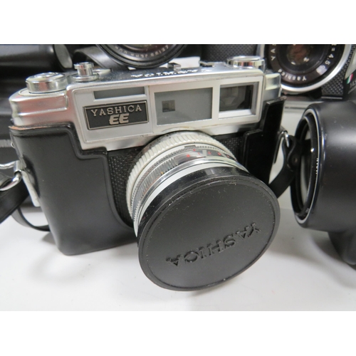 600 - Selection of Yashica Cameras plus Movie Cameras. See photos.