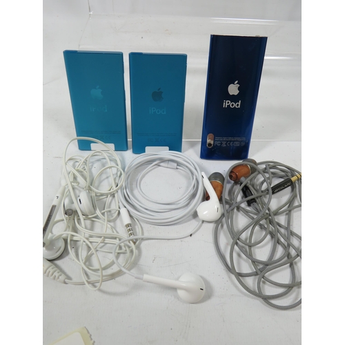 602 - Three Apple Ipods with headsets etc.    An  A1320 plus two 18A-1446's See photos.