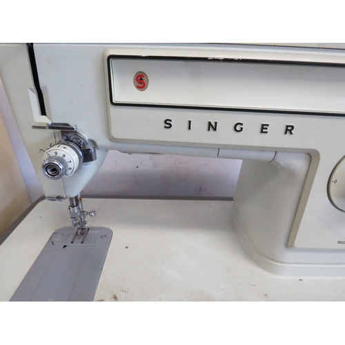 1143 - Vintage Singer Electric Sewing machine with case