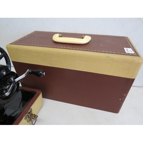 1145 - Singer Sewing machine 95K in very good condition with original case in good order see photos.