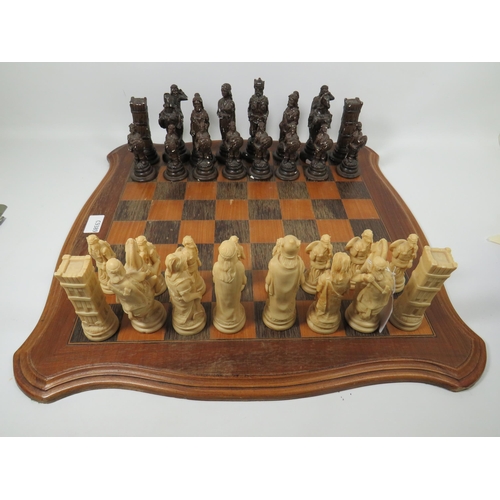 999 - Lovely Two Colour Wooden Chess board which measures approx 19 x 19 inches.  The Black Army is cast f... 