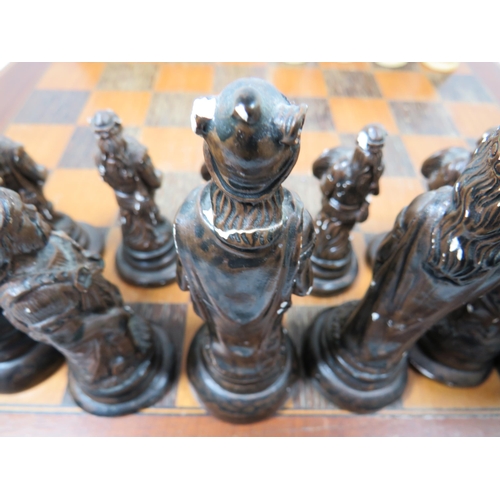 999 - Lovely Two Colour Wooden Chess board which measures approx 19 x 19 inches.  The Black Army is cast f... 