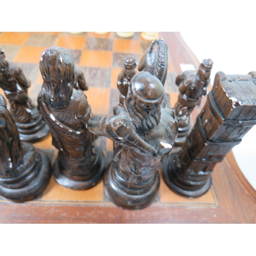 999 - Lovely Two Colour Wooden Chess board which measures approx 19 x 19 inches.  The Black Army is cast f... 