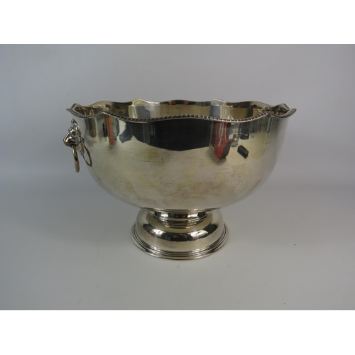 614 - Silver plated on copper large pedstal fruit bowl with lion head handles, 7