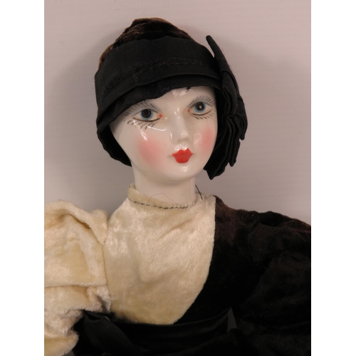 626 - Vintage Porcelain doll in art deco clothing.