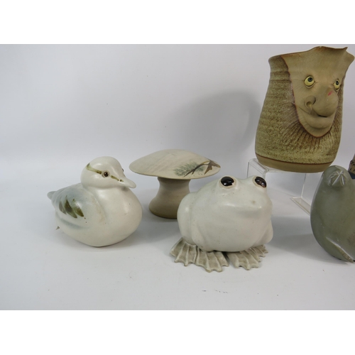 648 - Job lot of studio pottery and a soapstone Canadian seal sculpture.