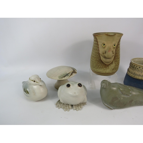 648 - Job lot of studio pottery and a soapstone Canadian seal sculpture.