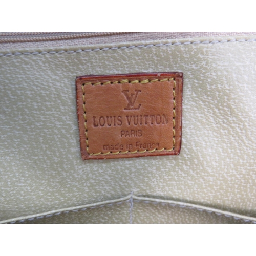 658 - Large Lois Vuitton weekend bag, 13.5