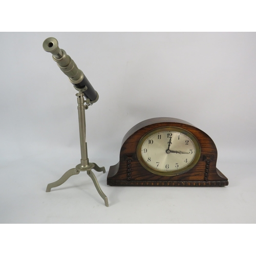 695 - Art deco wooden mantle clock in working order plus a small french table top telescope.