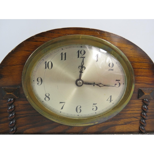 695 - Art deco wooden mantle clock in working order plus a small french table top telescope.