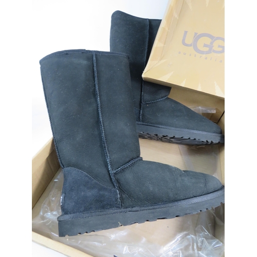 699 - Pair of Genuine Ugg boots with box, worn once. Size 6.5.