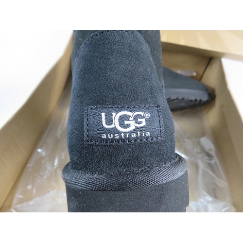 699 - Pair of Genuine Ugg boots with box, worn once. Size 6.5.