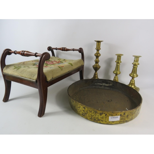 703 - Mixed lot to include an antique foot stool, a large heavy brass tray and three candle sticks.