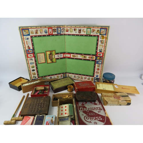 744 - Large selection of vintage board games, dominoes, chess sets, cards etc.