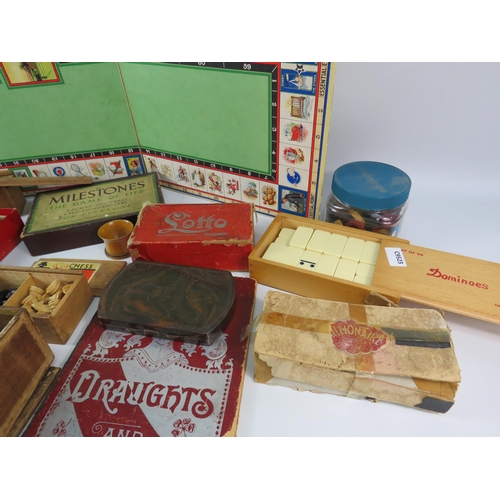 744 - Large selection of vintage board games, dominoes, chess sets, cards etc.