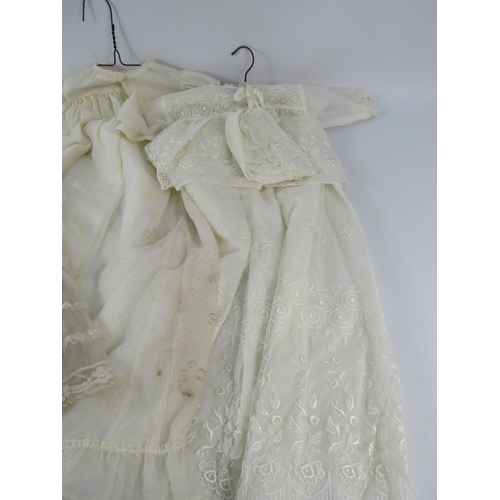 752 - Five vintage christening gowns.