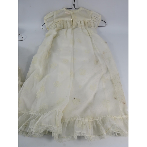 752 - Five vintage christening gowns.