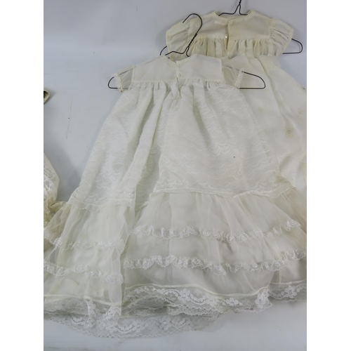 752 - Five vintage christening gowns.