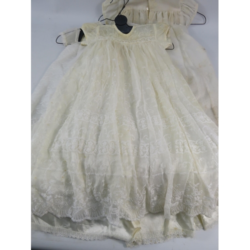 752 - Five vintage christening gowns.