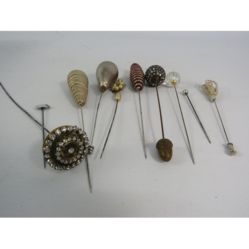 764 - 10 Vintage hat pins.